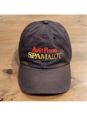 Monty Pythons Spamalot Hat Strap Back Black Faded One Size Adjustable